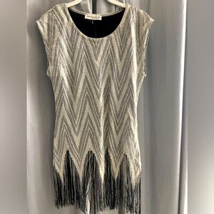NWT sparkly champagne colored top with fringe bottom